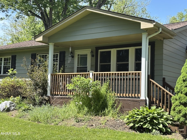 897 Burns Ave, Altoona, PA 16601 - view of front of property with covered porch and roof with shingles