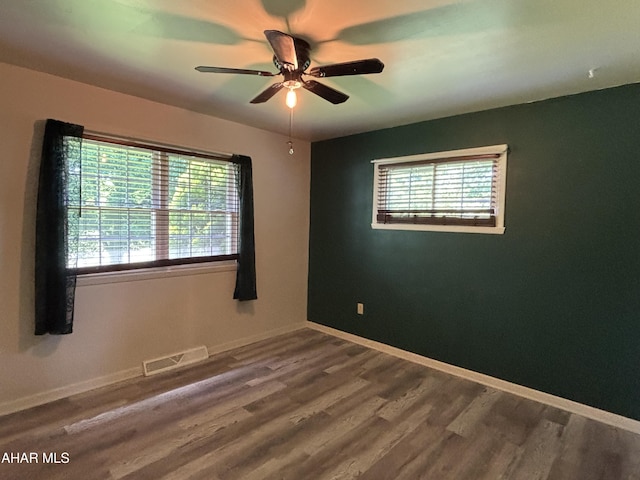 897 Burns Ave, Altoona, PA 16601 - spare room featuring plenty of natural light, ceiling fan, and wood finished floors