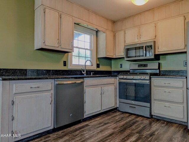 151 Rio Grande Rd, Clearville, PA 15535 - kitchen featuring appliances with stainless steel finishes, dark wood-style flooring, and dark stone counters