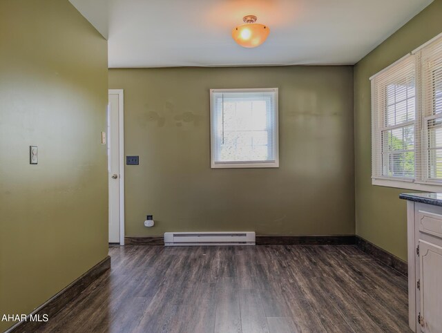 151 Rio Grande Rd, Clearville, PA 15535 - laundry area featuring baseboard heating, dark wood-type flooring, and plenty of natural light