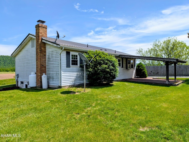 151 Rio Grande Rd, Clearville, PA 15535 - rear view of property with a chimney, a patio, and metal roof