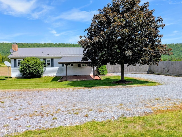 151 Rio Grande Rd, Clearville, PA 15535 - back of house featuring metal roof and a chimney