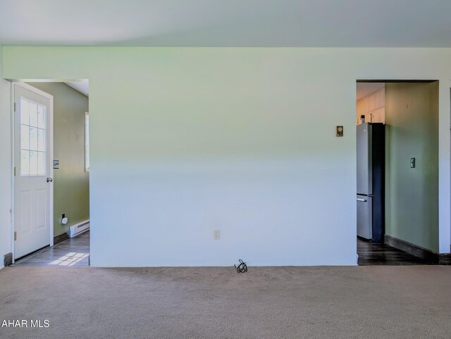 151 Rio Grande Rd, Clearville, PA 15535 - unfurnished room with a baseboard radiator and dark colored carpet