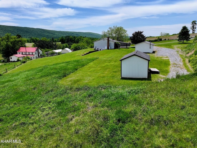 151 Rio Grande Rd, Clearville, PA 15535 - view of grassy yard featuring an outdoor structure and a view of rural / pastoral area