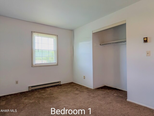 151 Rio Grande Rd, Clearville, PA 15535 - unfurnished bedroom featuring a baseboard heating unit, carpet floors, and a closet