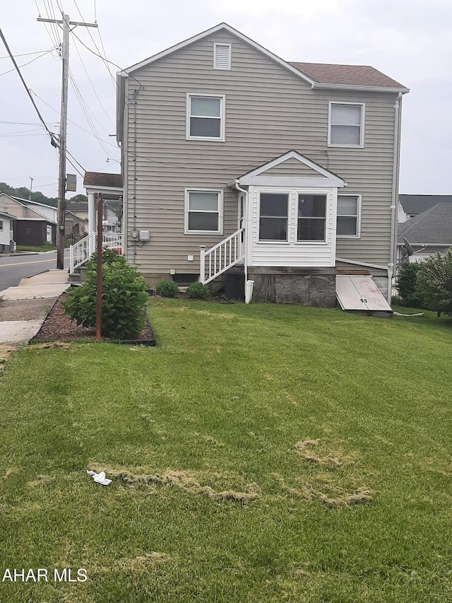 304 Forest St, Gallitzin, PA 16641 - back of house featuring a lawn
