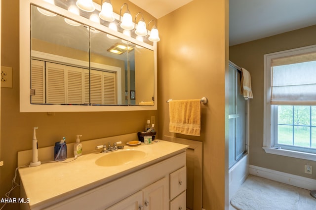 7241 Morgans Rd, Huntingdon, PA 16652 - bathroom with vanity, baseboards, and bath / shower combo with glass door