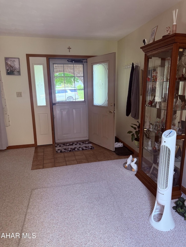 524 Elm Ln, Duncansville, PA 16635 - tiled foyer entrance featuring carpet flooring and baseboards
