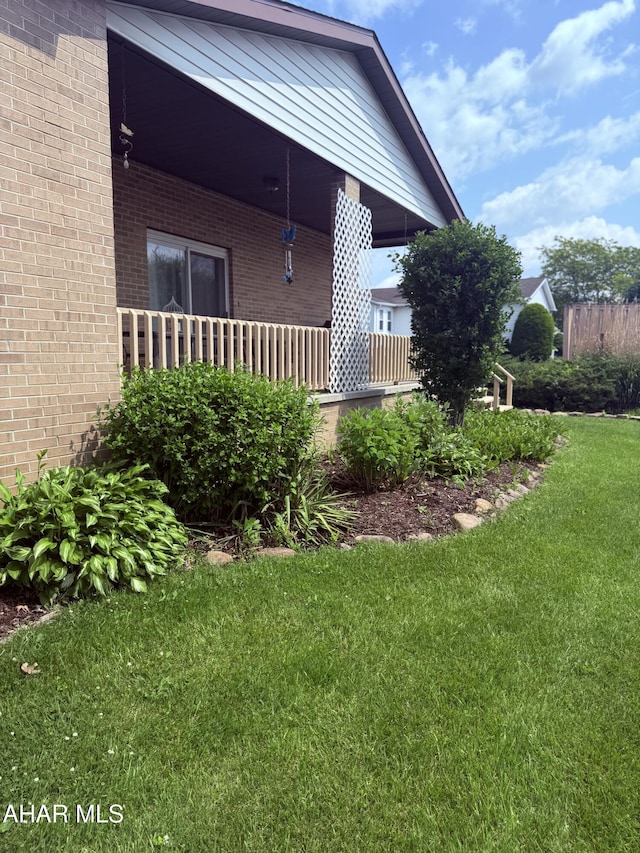 524 Elm Ln, Duncansville, PA 16635 - view of side of home with a lawn and brick siding