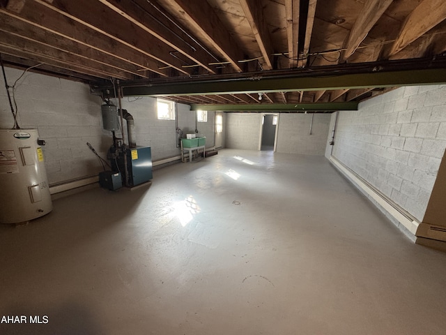 basement featuring electric water heater