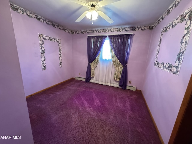 empty room with carpet floors, ceiling fan, and a baseboard heating unit