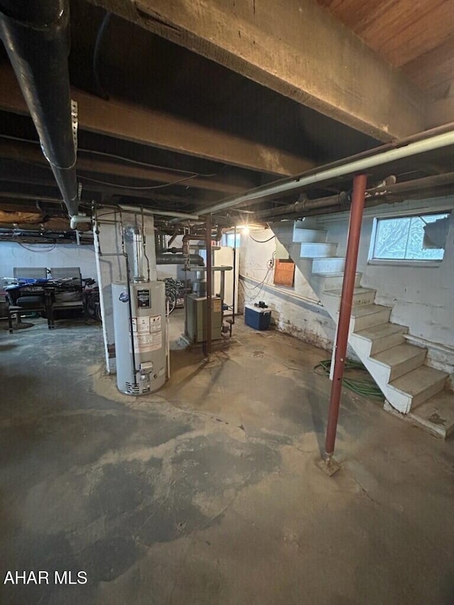 basement featuring gas water heater