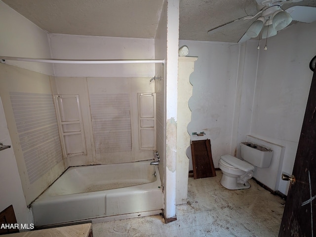 bathroom featuring  shower combination, toilet, and ceiling fan