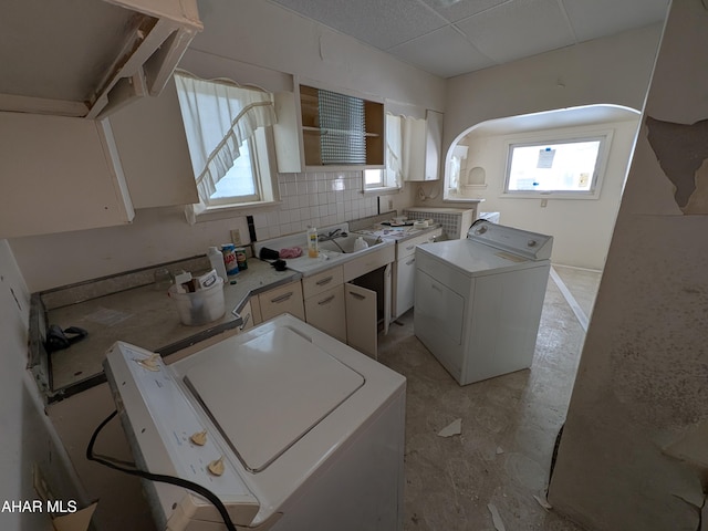 laundry area featuring washer / dryer and sink