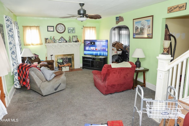 1211 20th St, Altoona, PA 16601 - carpeted living area with a brick fireplace and ceiling fan