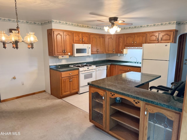 2715 16th St, Altoona, PA 16601 - kitchen with white appliances, a sink, brown cabinetry, a ceiling fan, and light carpet