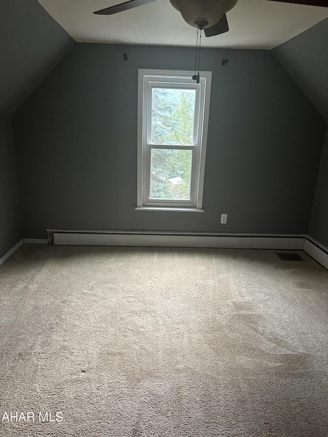 bonus room featuring carpet floors, ceiling fan, and lofted ceiling