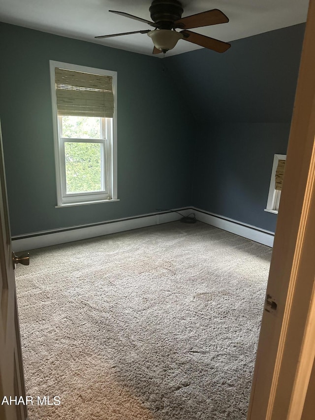 spare room featuring carpet flooring and ceiling fan