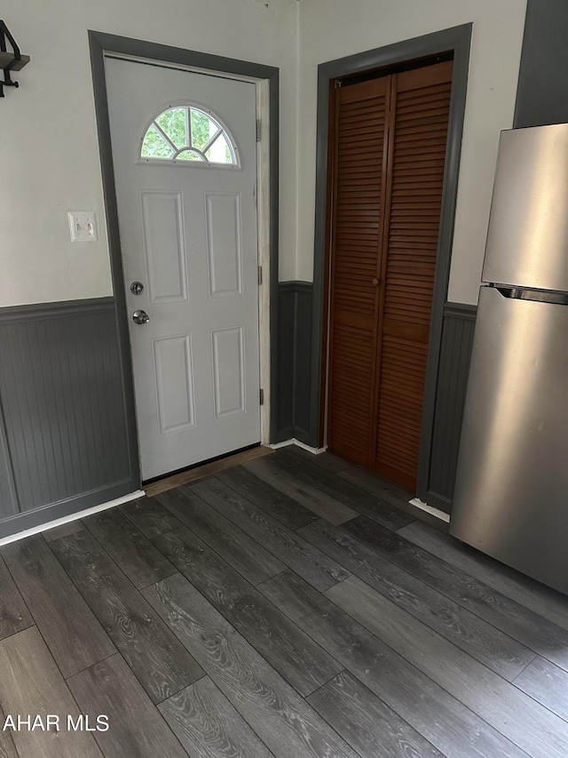 foyer entrance featuring dark hardwood / wood-style flooring