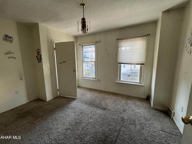 unfurnished room featuring carpet floors