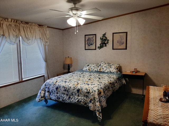 bedroom featuring ceiling fan, dark carpet, a textured ceiling, and ornamental molding