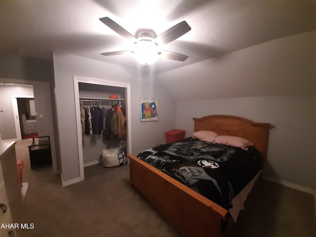 carpeted bedroom featuring a closet, ceiling fan, and lofted ceiling