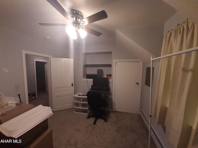 carpeted office featuring ceiling fan and lofted ceiling