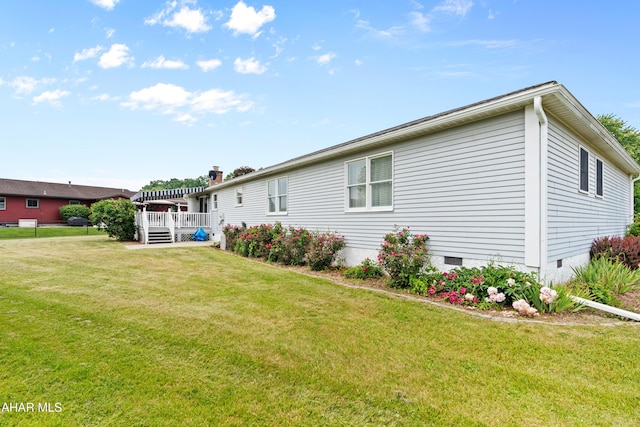 409 Tree Ln, Duncansville, PA 16635 - back of property with crawl space, a lawn, and a wooden deck