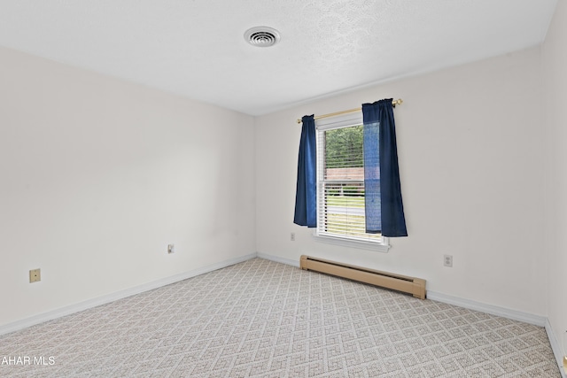 409 Tree Ln, Duncansville, PA 16635 - carpeted spare room featuring a baseboard radiator and baseboards