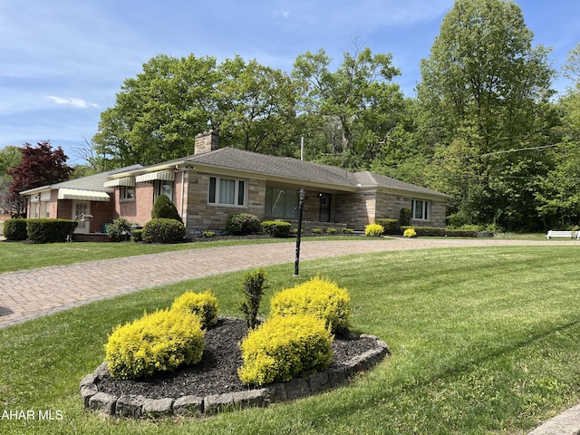 3353 Sylvan Heights Dr, Hollidaysburg, PA 16648 - view of front of house with stone siding, a front lawn, and a chimney