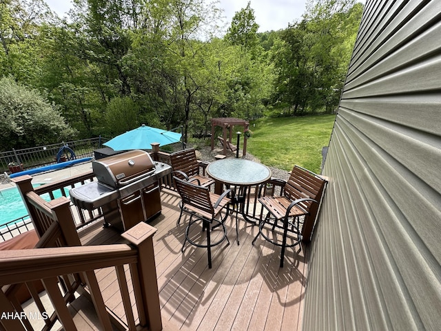 3406 Granada Way, Altoona, PA 16601 - wooden deck with outdoor dining space and view of scattered trees