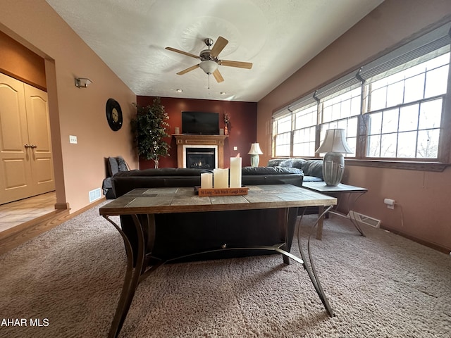 3406 Granada Way, Altoona, PA 16601 - living area with a ceiling fan, a glass covered fireplace, carpet floors, and baseboards