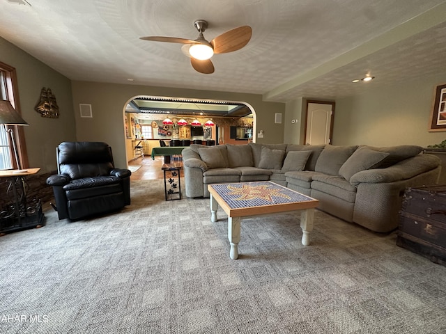 3406 Granada Way, Altoona, PA 16601 - living room featuring arched walkways, carpet flooring, and ceiling fan