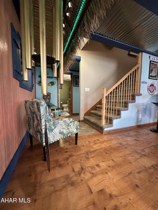 3406 Granada Way, Altoona, PA 16601 - living area featuring stairway, baseboards, and wood finished floors