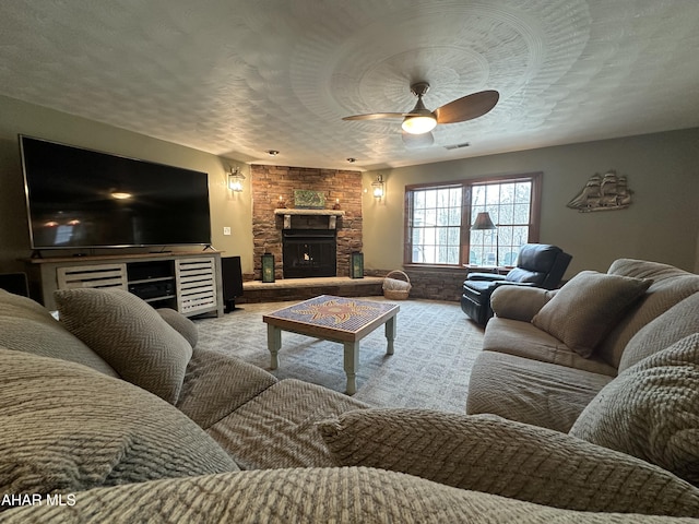 3406 Granada Way, Altoona, PA 16601 - living room featuring ceiling fan and a stone fireplace
