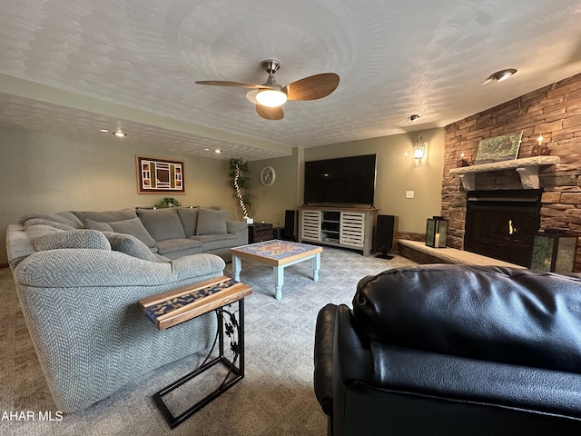 3406 Granada Way, Altoona, PA 16601 - living area featuring ceiling fan, a fireplace, carpet flooring, and a textured ceiling