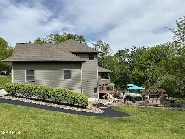 3406 Granada Way, Altoona, PA 16601 - rear view of property featuring a yard, a wooden deck, and a shingled roof