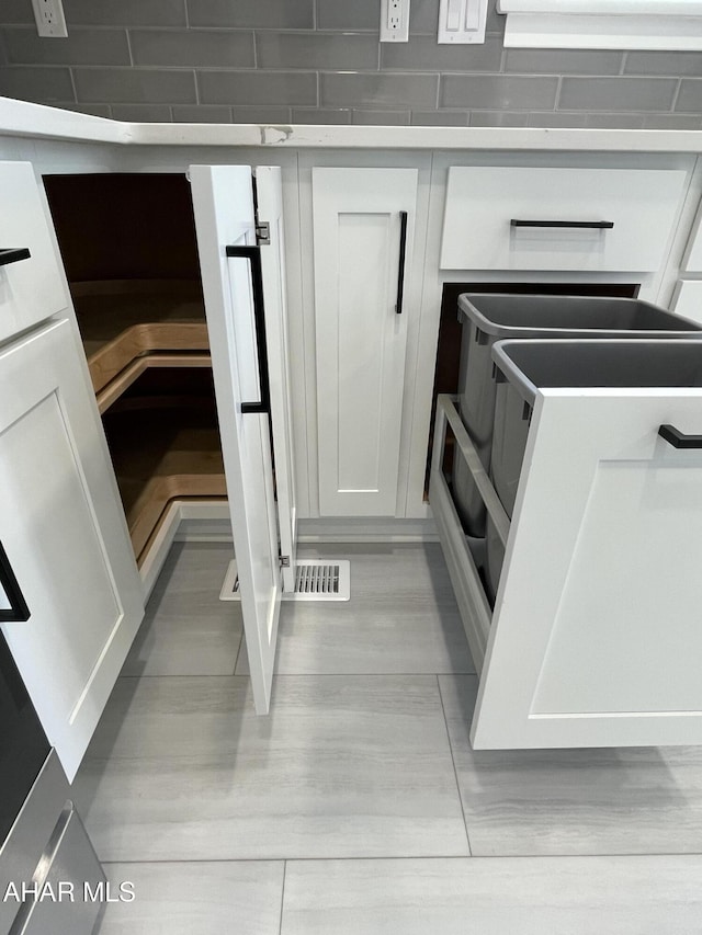 details featuring white cabinets