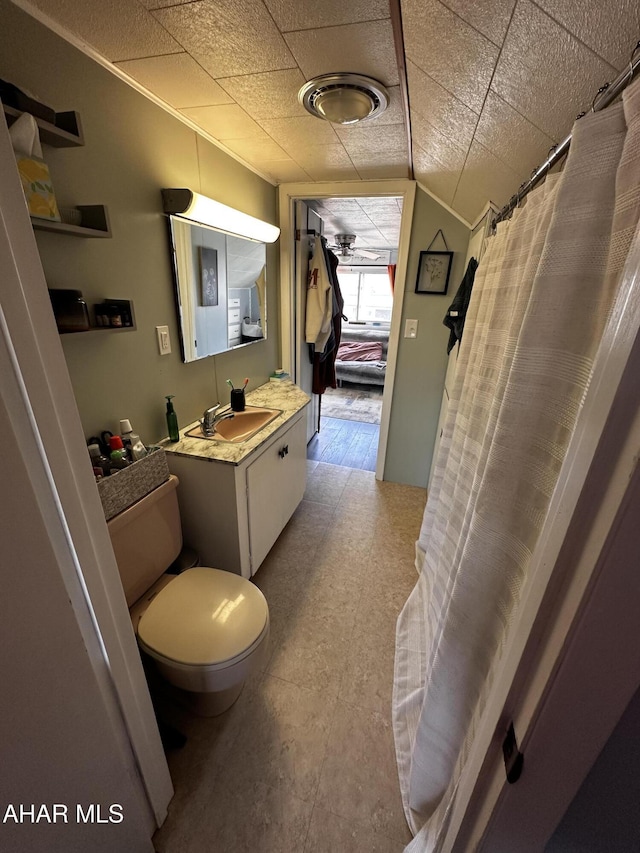 401 Park Ave, Clearfield, PA 16830 - bathroom with toilet, vanity, a shower with shower curtain, and tile patterned floors