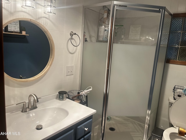 401 Park Ave, Clearfield, PA 16830 - bathroom with tile walls, toilet, a stall shower, and vanity