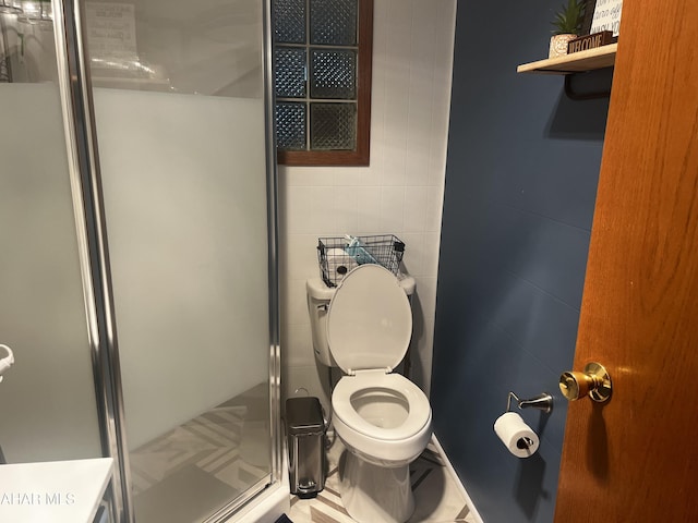 401 Park Ave, Clearfield, PA 16830 - full bathroom featuring a stall shower, tile walls, and toilet