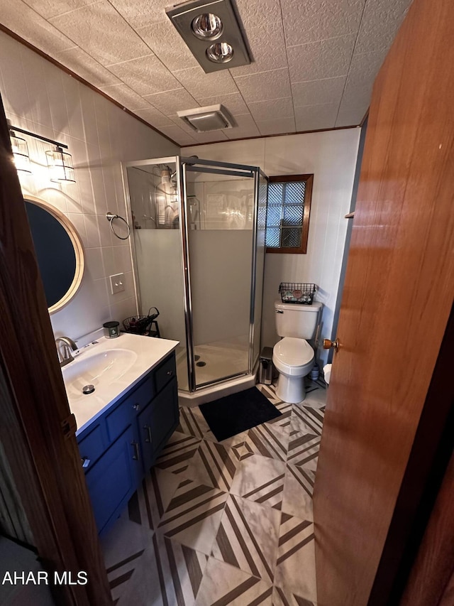 401 Park Ave, Clearfield, PA 16830 - full bathroom with toilet, vanity, a stall shower, and wooden walls