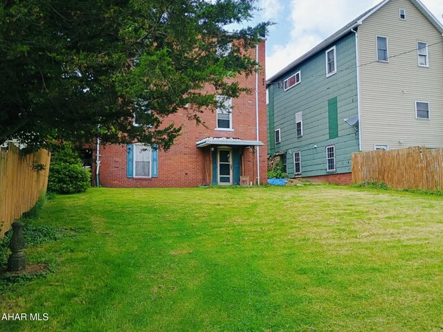 818 5th Ave, Patton, PA 16668 - rear view of property with brick siding