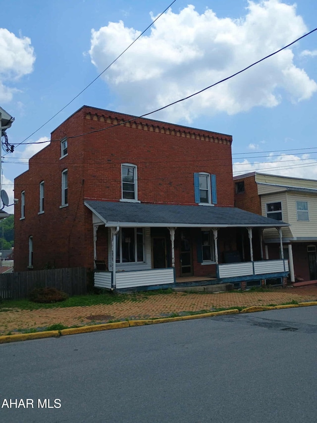 818 5th Ave, Patton, PA 16668 - view of front facade featuring brick siding and a porch