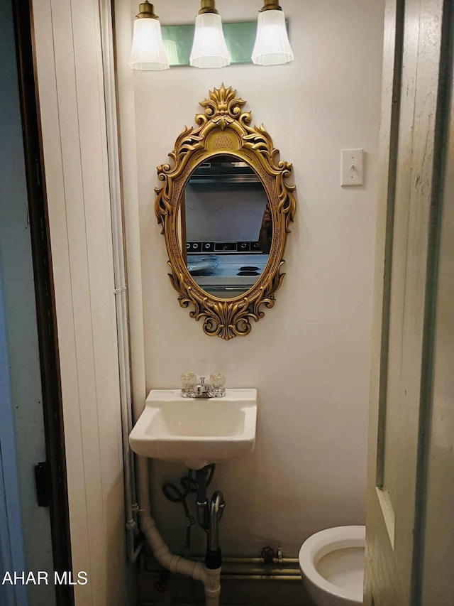 818 5th Ave, Patton, PA 16668 - bathroom featuring toilet and a sink