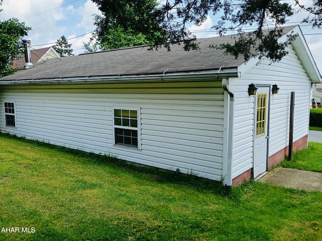 818 5th Ave, Patton, PA 16668 - view of side of property featuring roof with shingles and a yard
