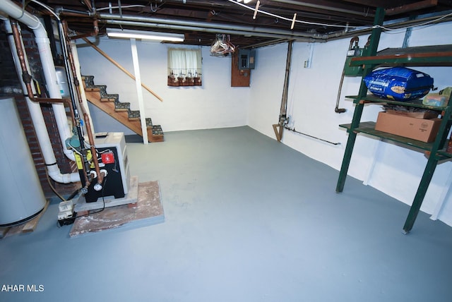 basement with gas water heater and electric panel