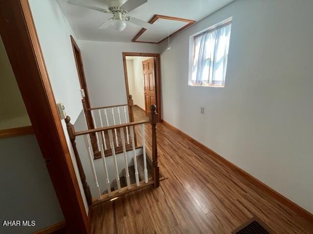 125 Broad St, Hollidaysburg, PA 16648 - unfurnished room with attic access, wood finished floors, and a ceiling fan