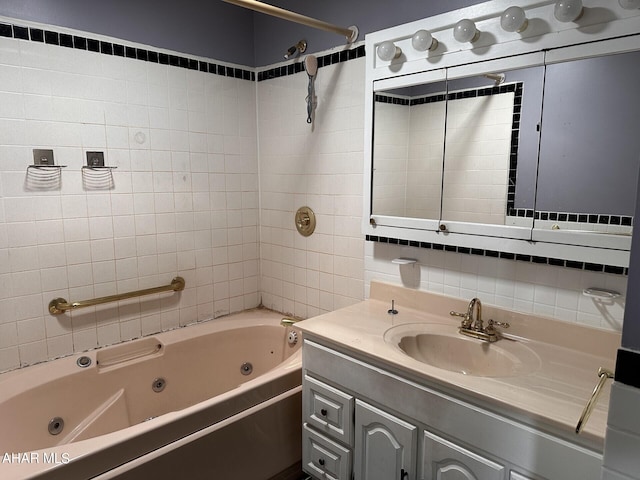 bathroom with vanity and tiled shower / bath