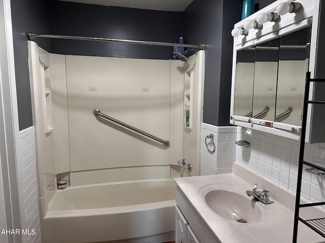 bathroom featuring vanity and shower / washtub combination